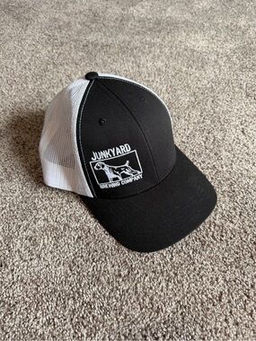 The Classic Black and White Mesh Trucker Hat